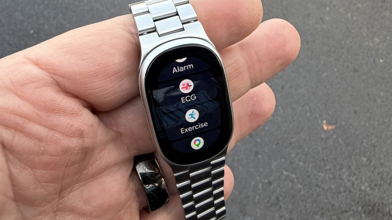 Man holding the Fitbit Edge