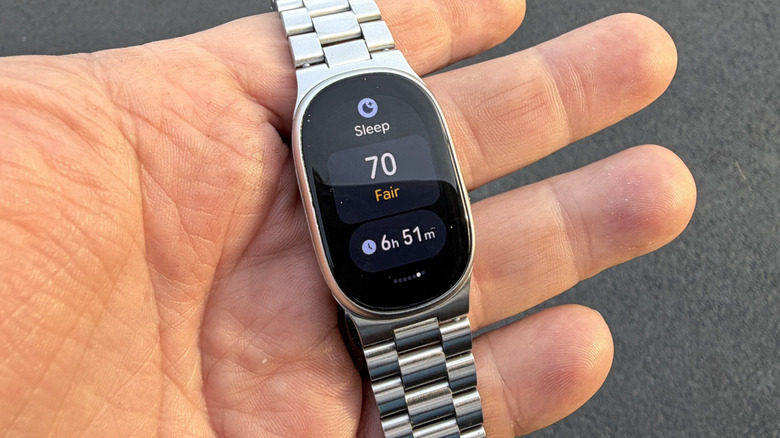 Man holding the Fitbit Edge