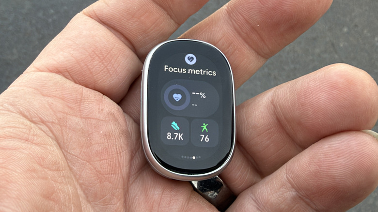 Man holding the Fitbit Edge