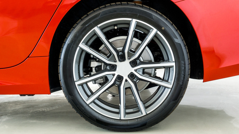 Rear wheel and tire of a sports car