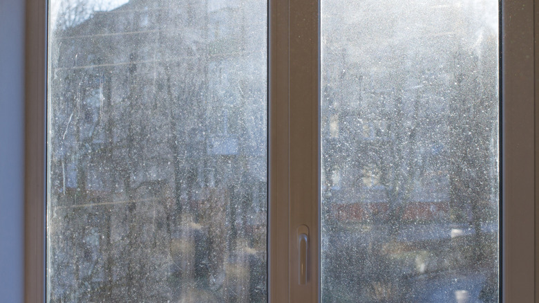 A dirty window in the city