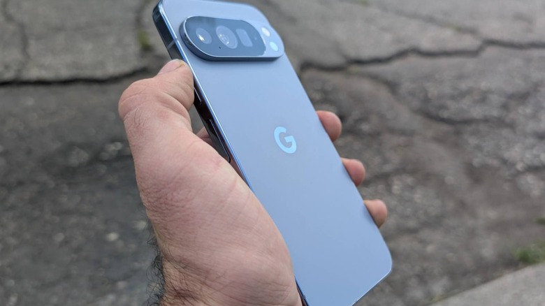 Google Pixel 10 Pro XL held by human hand.