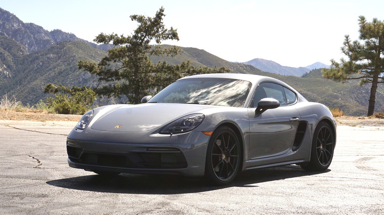 2025 Porsche 718 Cayman GTS 4.0 parked on a mountain road
