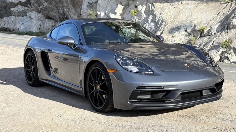 2025 Porsche 718 Cayman GTS 4.0 parked on a mountain road