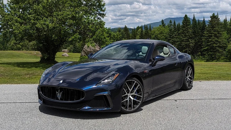 Maserati GranTurismo Trofeo parked near the forest