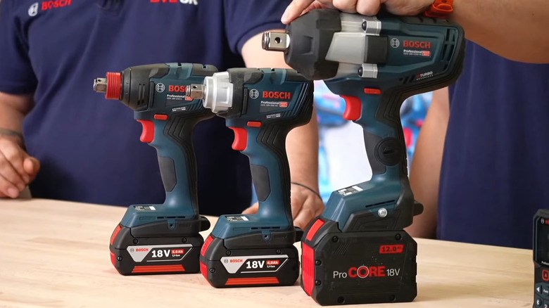 Three Bosch Connected Ready tools on display on wooden table