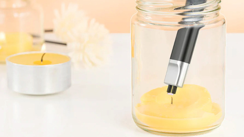 Lighting a candle using the Reidea USB electric lighter
