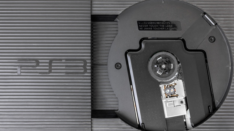 Sony PlayStation 3 with its Blu-ray disc drive exposed.