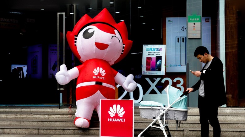 Huawei mascot outside retail store