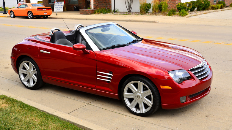 red Crossfire convertible on street