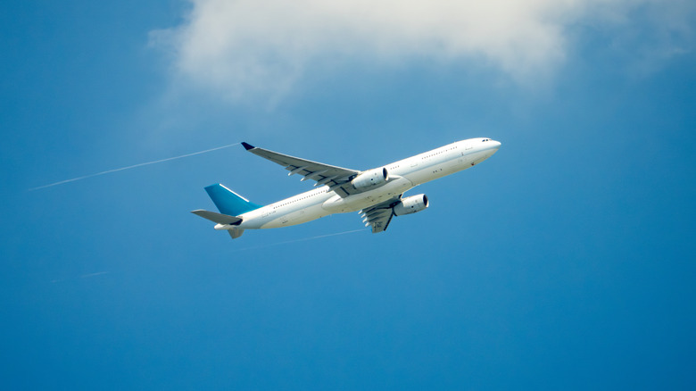A passenger airplane mid-flight.