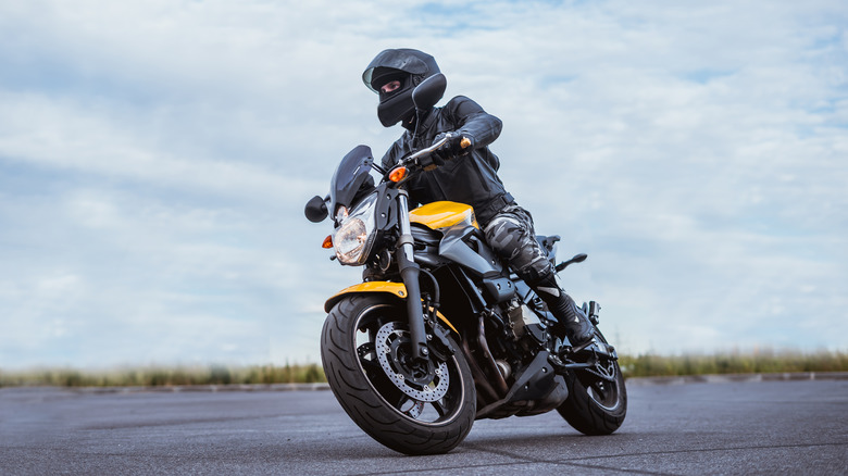 man riding motorcycle