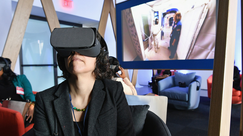 woman using Daydream VR headset