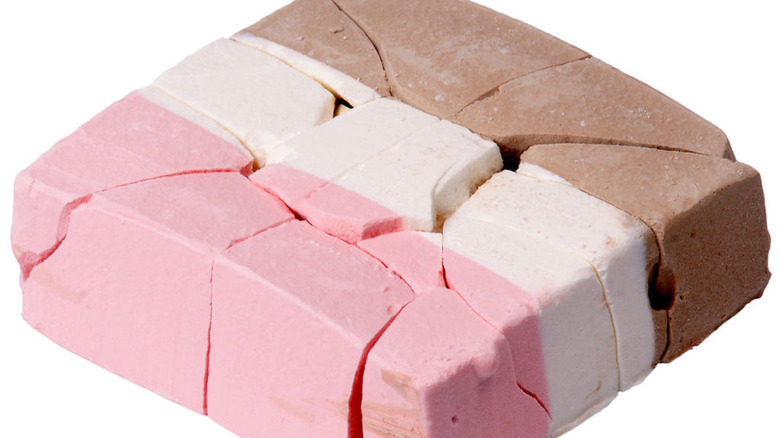 A cube of freeze dried Neapolitan ice cream