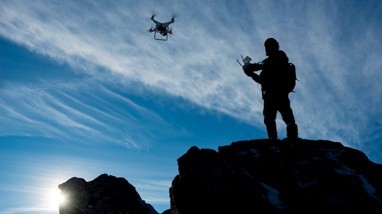 Man piloting a drone