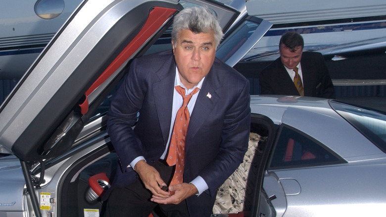 Jay Leno exiting car