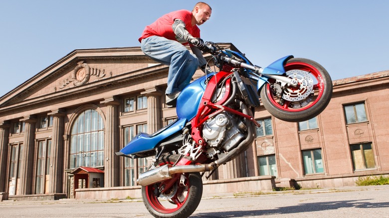rider on motorbike in the air