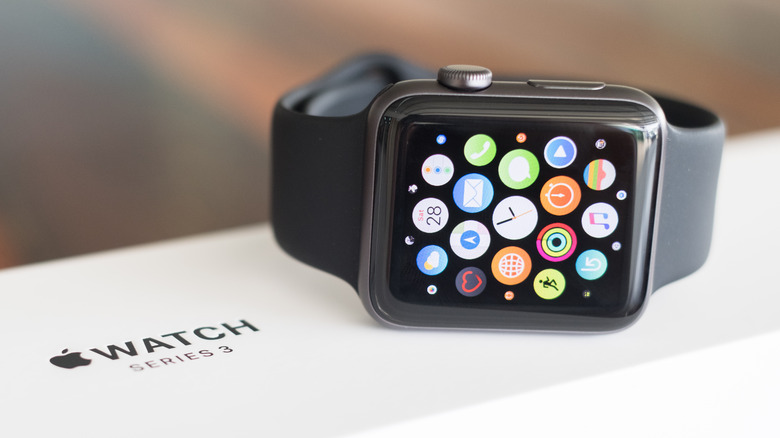 Apple Watch Series atop its retail box