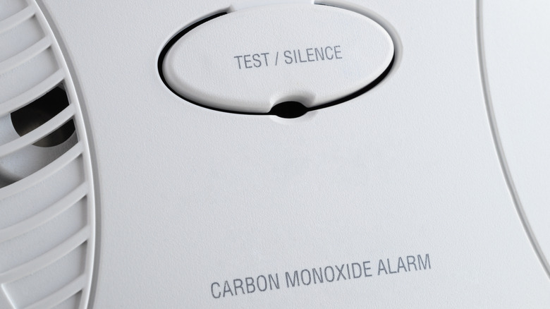 Close-up of test button on a carbon monoxide alarm