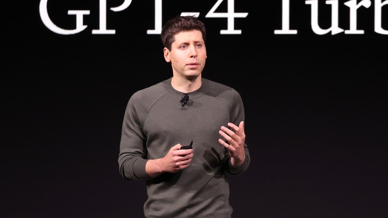 Sam Altman near GPT-4 sign