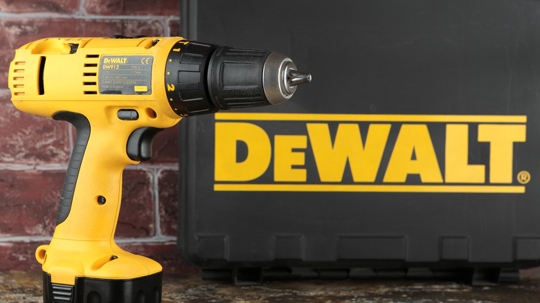 Driver in front of DeWalt logo