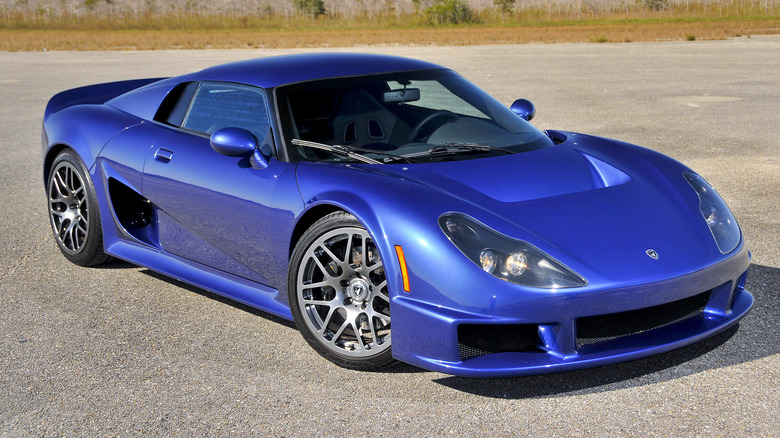 Blue Rossion Q1 supercar outdoors