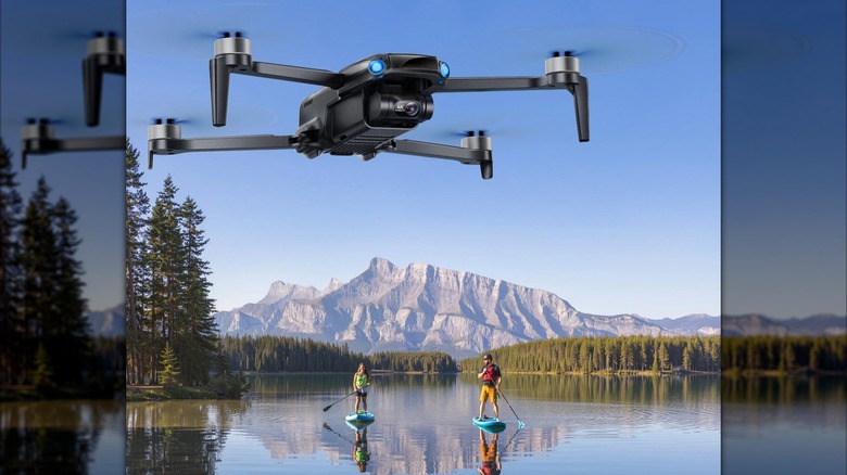 Ruko U11MINI 4K Drone hovering over two paddleboarders