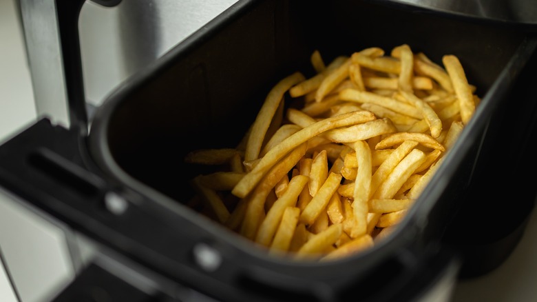 French fries in an air fryer.