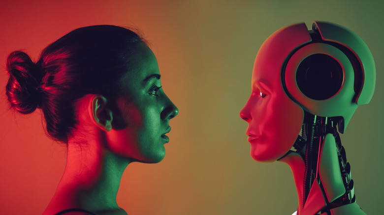 woman and robot facing each other