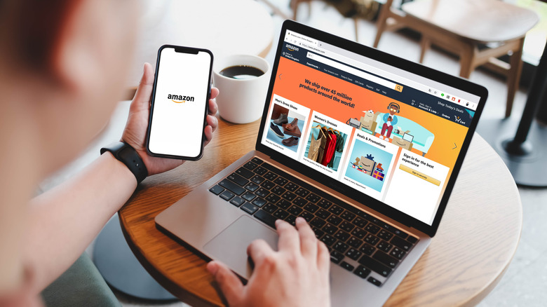 A person using Amazon on both a smartphone and a laptop