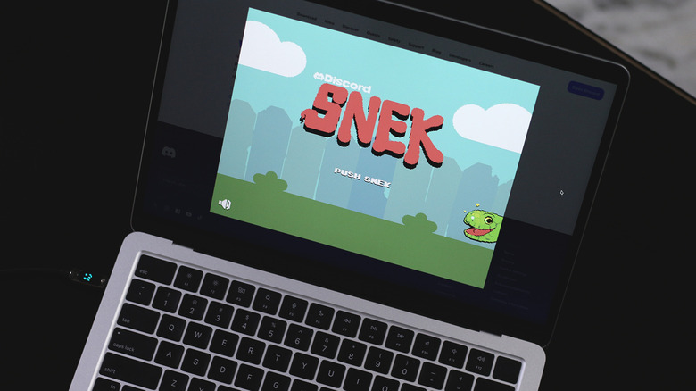 Discord's snake game on a laptop
