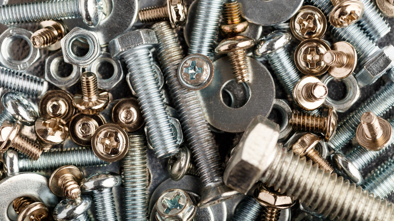 Mixture of random nuts and bolts strewn about