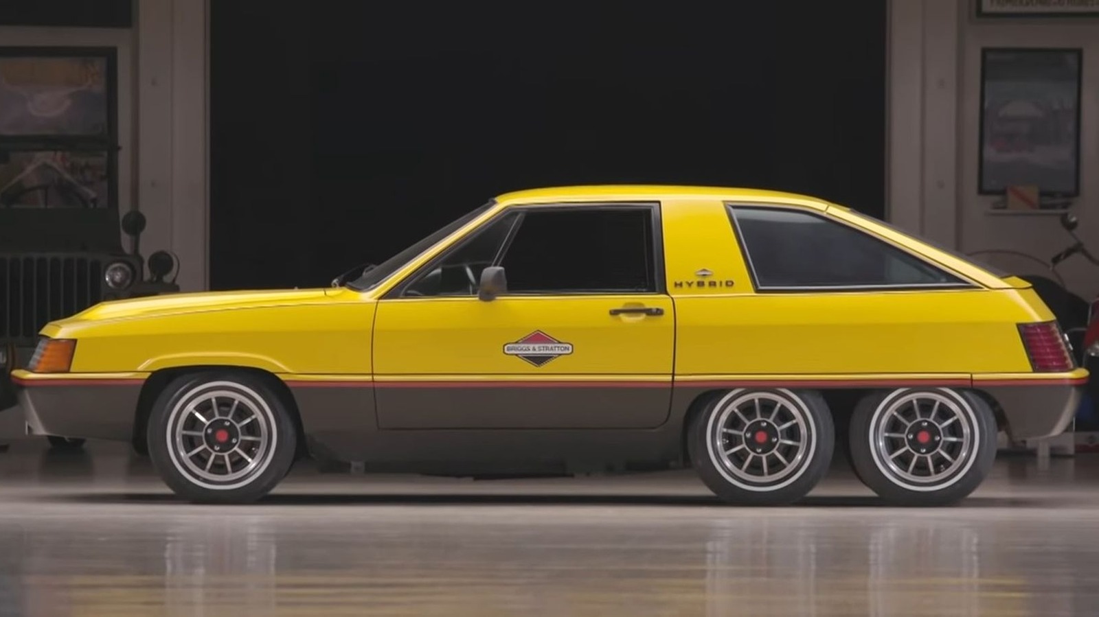 The Six Wheeled Hybrid Car You'd Never Guess Was Built By A Lawnmower Company