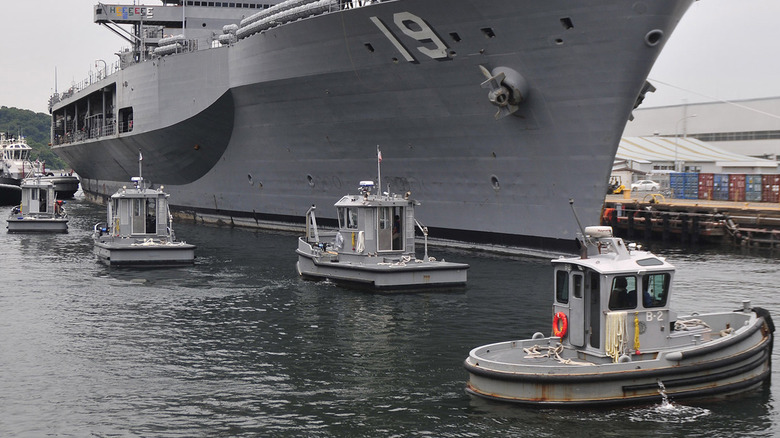 Fleet of Boomin Beavers alongside bigger US Navy ship