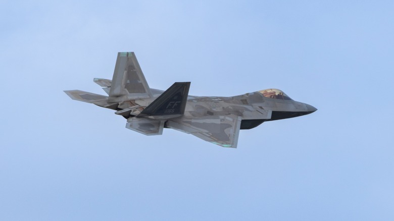 F22-A Raptor against a hazy sky