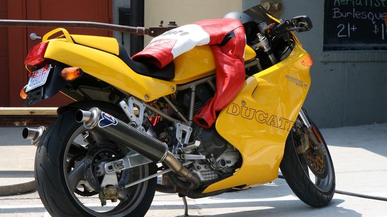 Yellow Ducati 900SS parked