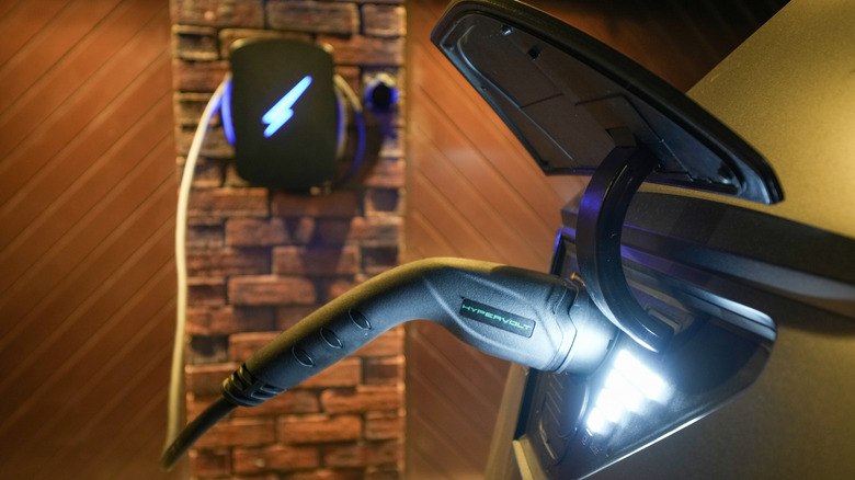 A battery electric vehicle (BEV) charges on a level 2 home charge point