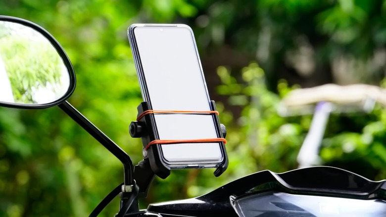 phone mounted to motorcycle handlebars