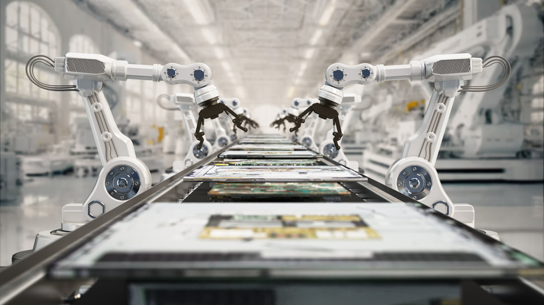 Robot arms in a manufacturing line
