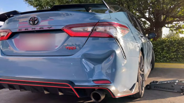 Dented Camry bumper