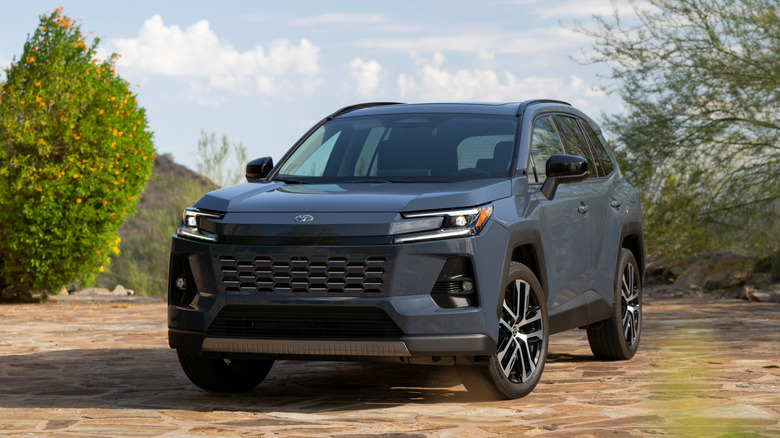 Front 3/4 shot of a 2026 Toyota RAV4 in bluish gray