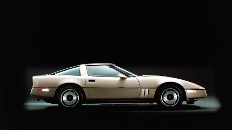 C4 Chevy Corvette against a black and gray studio background