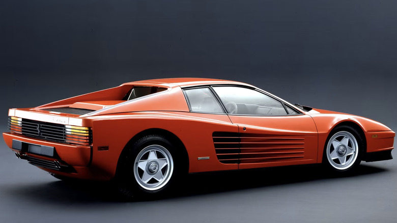 1984 Ferrari Testarossa against a gray studio background