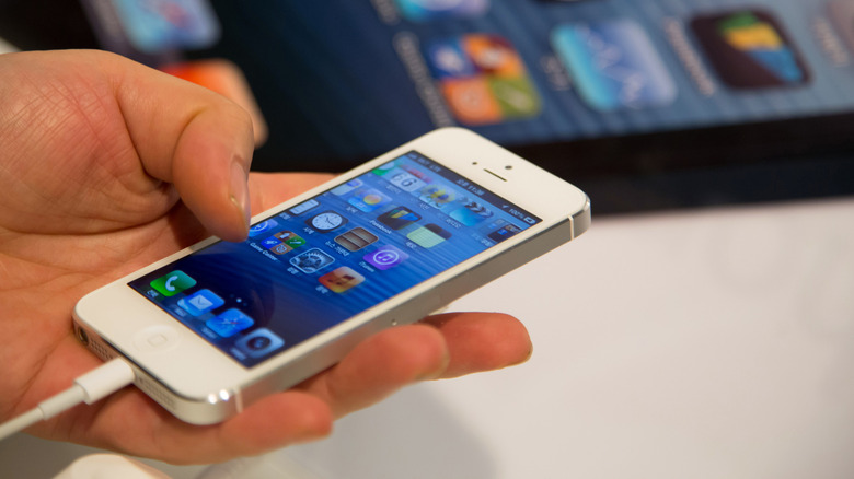 iPhone 5 in hand