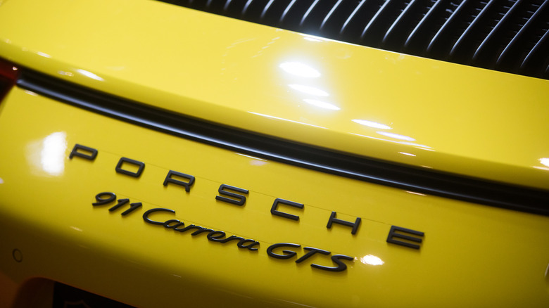 yellow Porsche 911 Carrera GTS