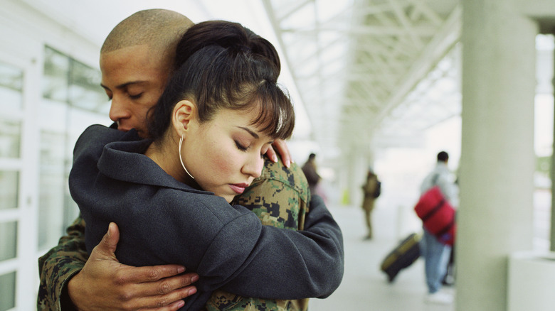 military man leaving for duty