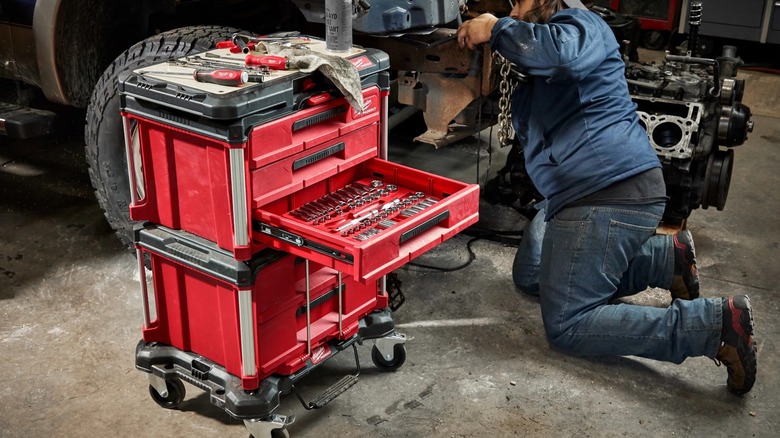 Packout stack on a Packout dolly in a mechanics shop.