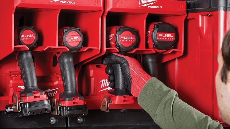 Two Packout tool stations on wall plate, filled with Milwaukee tools.
