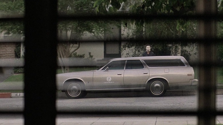 beige Ford station wagon