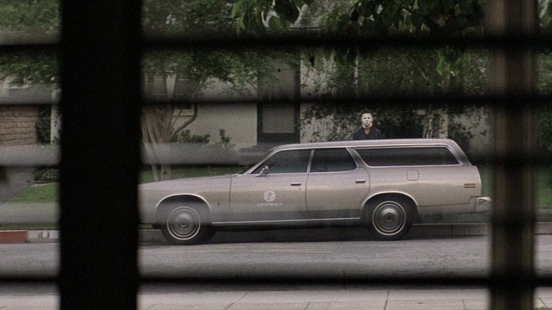 beige Ford station wagon
